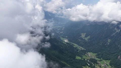 Aerial view of a mountain valley with clouds Stock Footage 317516138
