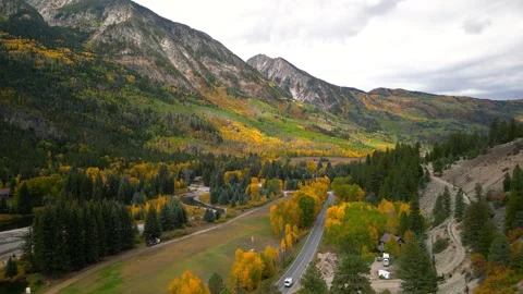 Aerial view of a mountain valley during autumn fall colors at Marble, Colorad Stock Footage 340486354