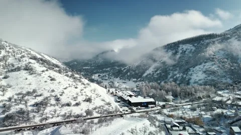 Aerial view of mountain valley with snow Video stock 330169088