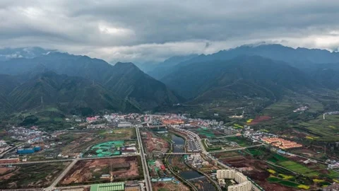 Aerial view of mountain valley town mountain distant scenery in Qinling Shaanxi Video stock 337925470