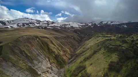 Aerial view of the mountainous terrain. Video stock 319442729