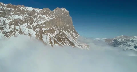 Aerial view of the mountains above the clouds Stock Footage 150664767
