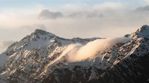Aerial view of mountains and clouds at sunset. Stock Footage 175100169
