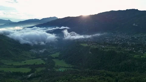 Aerial View of Mountains and Clouds at Sunrise in the Alps 스톡 동영상 277469164