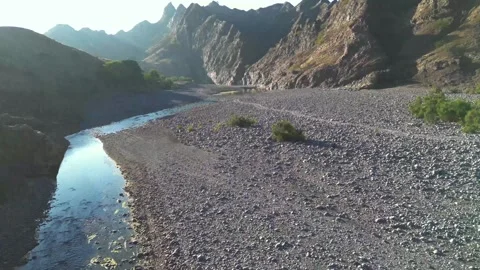 Aerial view of mountains and river, Pakistan. Stock Footage 332923277