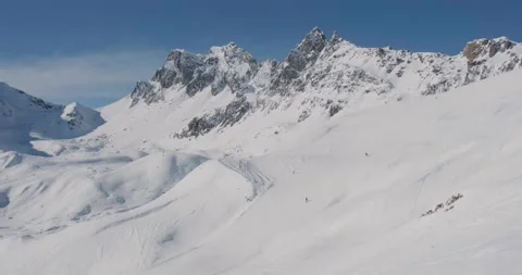 Aerial view of mountains and slopes at Samnaun ski resort, Switzerland. Video stock 245941905