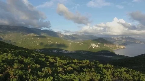 Aerial view mountains with clouds and coastline Stock Footage 81575280