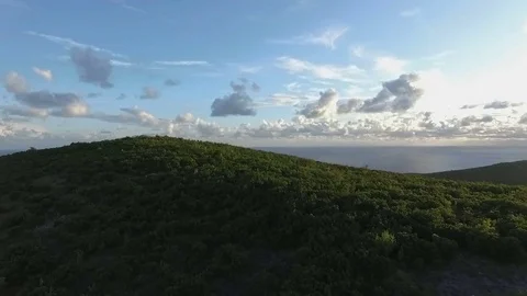 Aerial view mountains with clouds and coastline Stock Footage 81604989