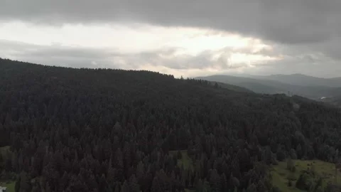 Aerial View Of Mountains, Clouds, Forest, And Sunset. Stock Footage 300740793