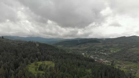 Aerial View Of Mountains, Clouds, Forests, And Sunlight. Stock Footage 299847757