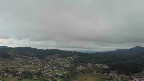 Aerial View Of Mountains, Clouds, Forests, And Sunlight. Vidéo 300378763