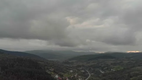 Aerial View Of Mountains, Clouds, Forests, And Sunlight. Vidéo 300740524