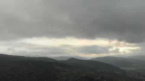 Aerial View Of Mountains, Clouds, Forests, And Sunlight. Vidéo 300740680
