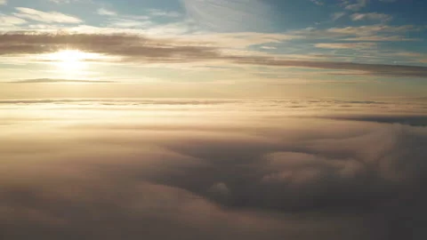 Aerial view of the mountains in the clouds at sunset. Faroe islands Stock Footage 170745625