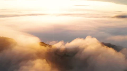 Aerial view of the mountains in the clouds at sunset. Faroe islands Stock Footage 170746453