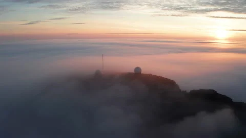 Aerial view of the mountains in the clouds at sunset. Faroe islands Stock Footage 170746936