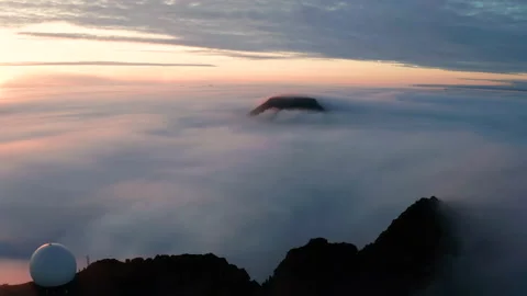 Aerial view of the mountains in the clouds at sunset. Faroe islands Stock Footage 170748013