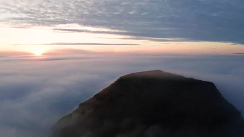 Aerial view of the mountains in the clouds at sunset. Faroe islands Stock Footage 170749058