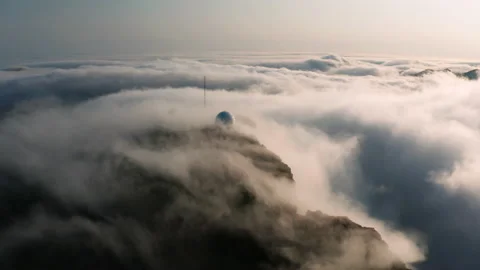 Aerial view of the mountains in the clouds at sunset. Faroe islands Stock Footage 170750486