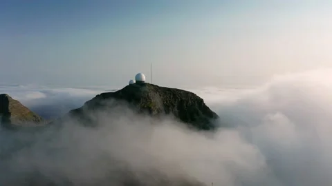 Aerial view of the mountains in the clouds at sunset. Faroe islands Stock Footage 202169230