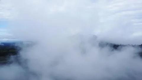 The aerial view of the mountains covered in clouds looks beautiful, piercin.. Stock Footage 301688055