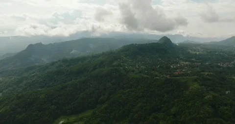 Aerial view of Mountains covered rainforest. Sumatra, Indonesia. Stock Footage 345395631