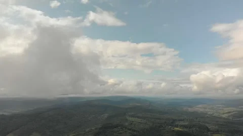 Aerial View Of Mountains, Forests, And Clouds. Vidéo 299848554