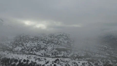 Aerial view of mountains in the mist. Stock Footage 72487911