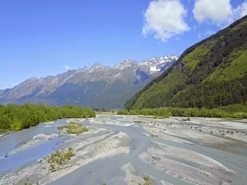 Aerial view of  Mountains over remote river, Glenorchy, New Zealand Stock-Footage 73268496