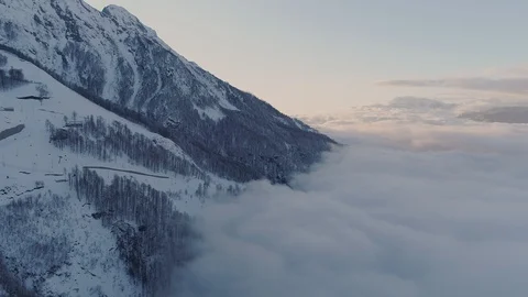 Aerial view of mountains over thick clouds Stock Footage 103538220