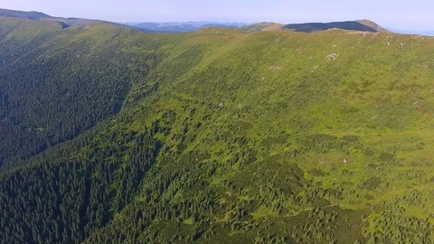 Aerial view of mountains range with forests Stock Footage 79987659