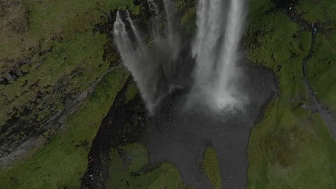 Aerial view to the mountains river flows through the valley and falls down Stock Footage 94352616