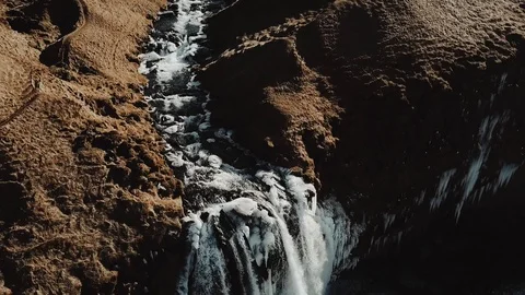 Aerial view to the mountains river flows through the valley and falls down. Stock Footage 97012218