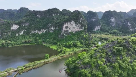 Aerial view of mountains in Tam Coc National Park, Ninh Binh Province - Vietnam. Stock Footage 287409499