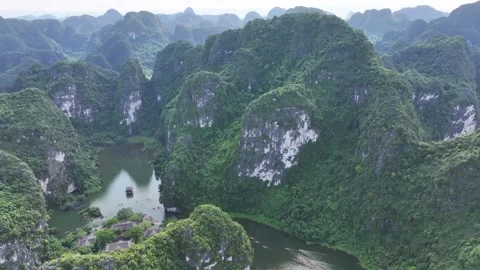 Aerial view of mountains in Tam Coc National Park, Ninh Binh Province - Vietnam. Stock Footage 287409780