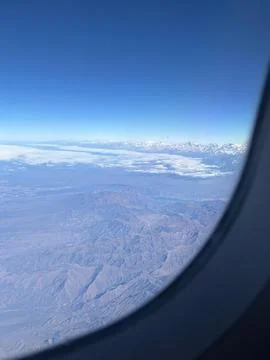Aerial view of mountains under clouds Stock Photos