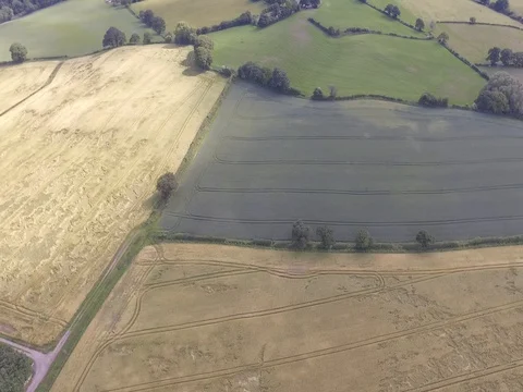 Aerial View Moving Backwards Over Welsh Farm Land in Hawarden Stock Footage 77243968
