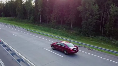 Aerial view of a moving car Stock Footage 77838208