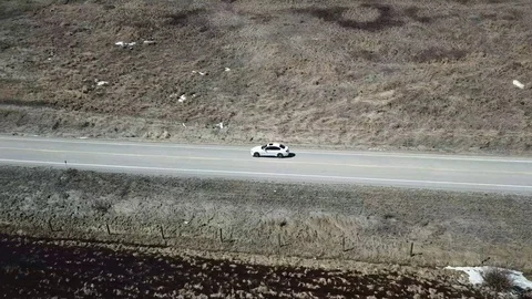 Aerial view of a moving car Stock Footage 89453529