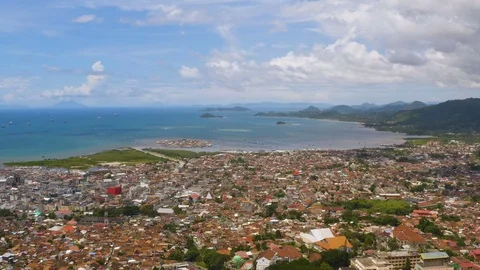 Aerial View Moving Forward of Lampung City Indonesia. Dense City Coastline. Stock Footage 105878079