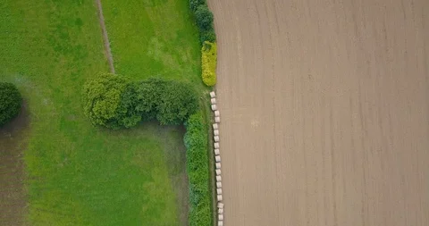 Aerial view moving forward through fields Video stock 87778126