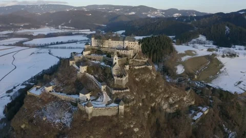 Aerial view moving to left shot, scenic view of a medieval castle on top Stock Footage 160704495