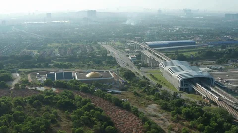 Aerial view of moving Light Rail Transit (LRT) near Putra Heights station Stock Footage 127012636