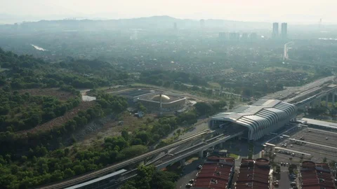 Aerial view of moving Light Rail Transit (LRT) near Putra Heights station Stock Footage 127015870