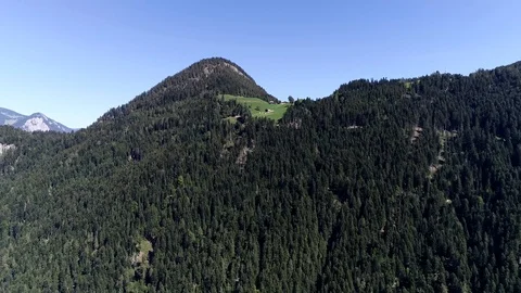 Aerial view moving towards mountain summit in Austria 4k Stock Footage 103426448