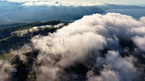 Aerial View of Moving White Clouds Above the Forest with Blue Sky Vídeo Stock 334246495