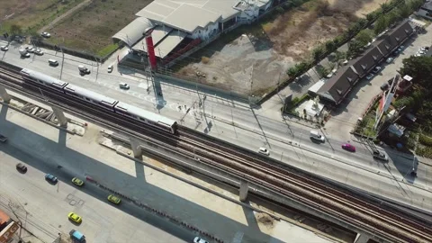 Aerial View Of MRT Sky Train Traveling On The Tracks In Thailand Stock Footage 262139270