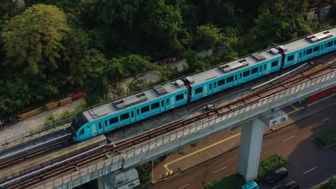 Aerial view of MRT train on elevated track in Jakarta, Indonesia. Stock Footage 340606194
