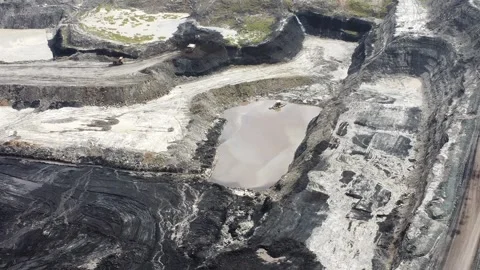 Aerial view of a mud suction device in a coal mining pit Stock Footage 329401657