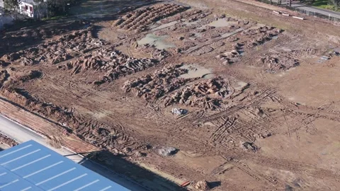 Aerial view of a muddy construction site Stock Footage 341260153